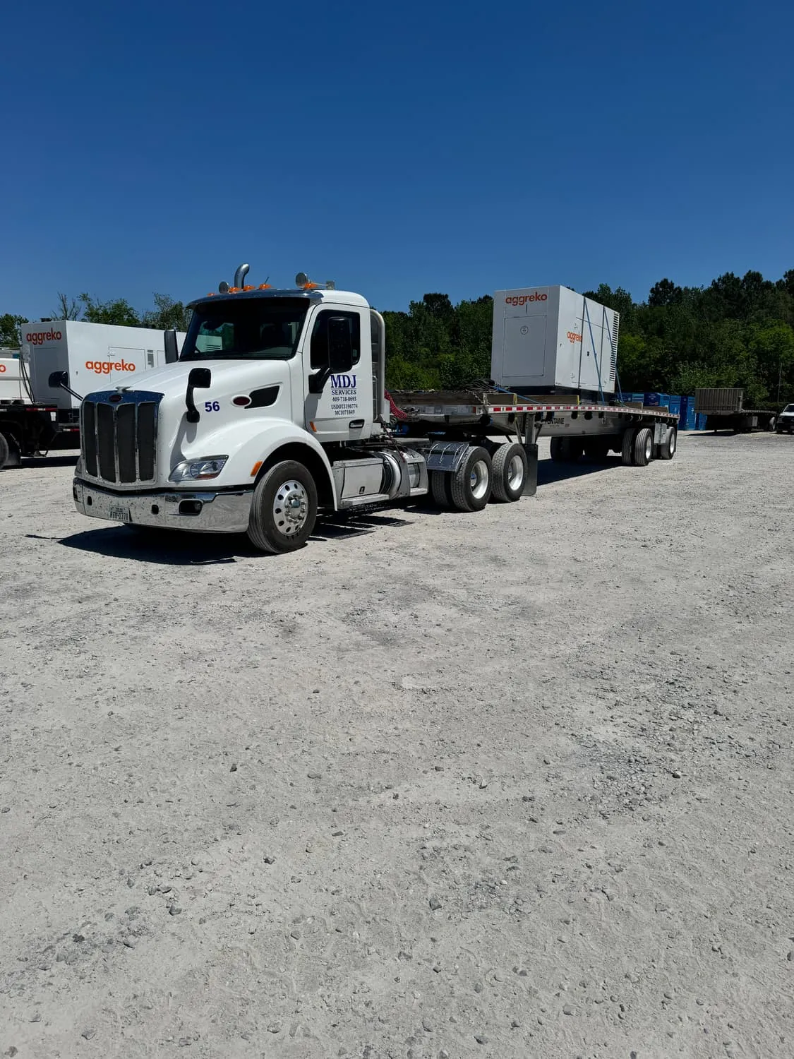 Industrial generator hauled on an MDJ Services flatbed in Beaumont, TX